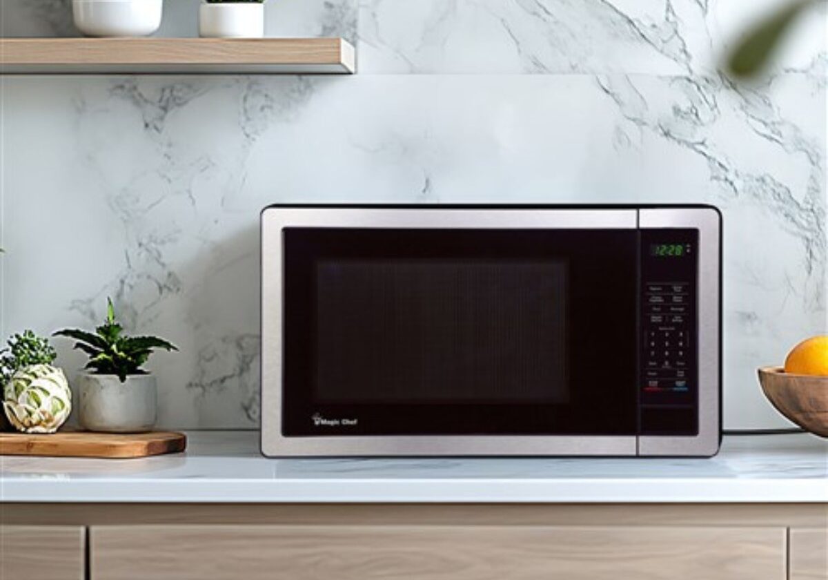 hotel microwaves Magic Chef microwave oven on a sleek countertop in a hotel guest room. Compact and efficient, this hospitality-grade microwave is ideal for quick heating and convenient in-room dining.