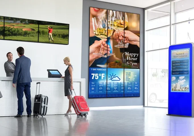 Hotel Lobby Installation, Mounted hotel TV with Peerless wall mount in modern lobby
