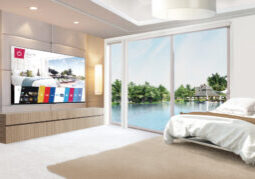 An LG Smart Hotel TV in action, seamlessly streaming television content through an advanced IPTV network to enhance the in-room experience for hotel guests. The television displays vivid images, showcasing the integration of cutting-edge technology to provide guests with an immersive and personalized entertainment experience.